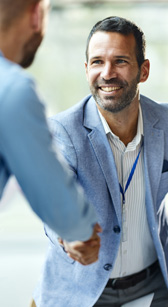 Two men shaking hands.